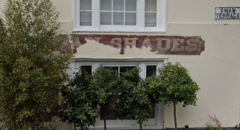 Swan Hotel Shades Ghost Sign (Google Apr. 2024)